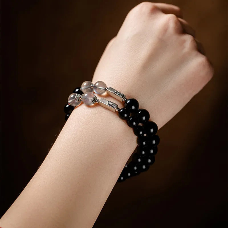 Obsidian Buddha beads couple bracelet set showing 8mm and 10mm stone beads in national style design