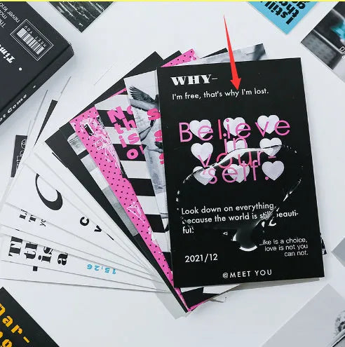 Box of fresh style creative postcards showing two different printed message designs.