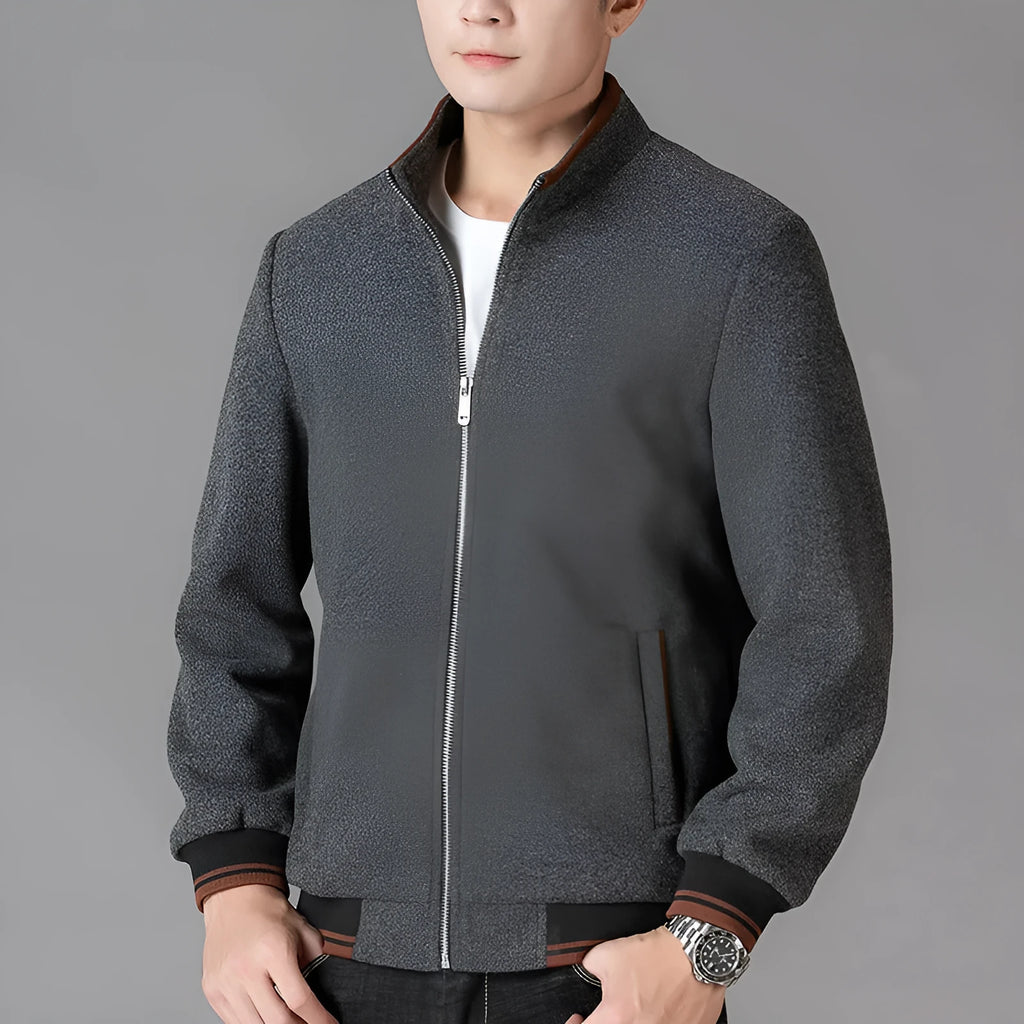 Men's grey woolen fleece autumn coat with long sleeves and size stick pockets on a sports style.