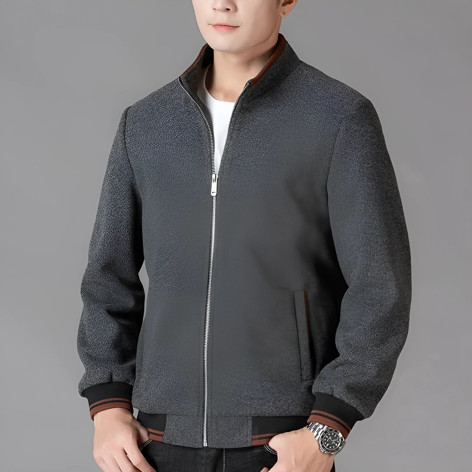 Men's grey woolen fleece autumn coat with long sleeves and size stick pockets on a sports style.