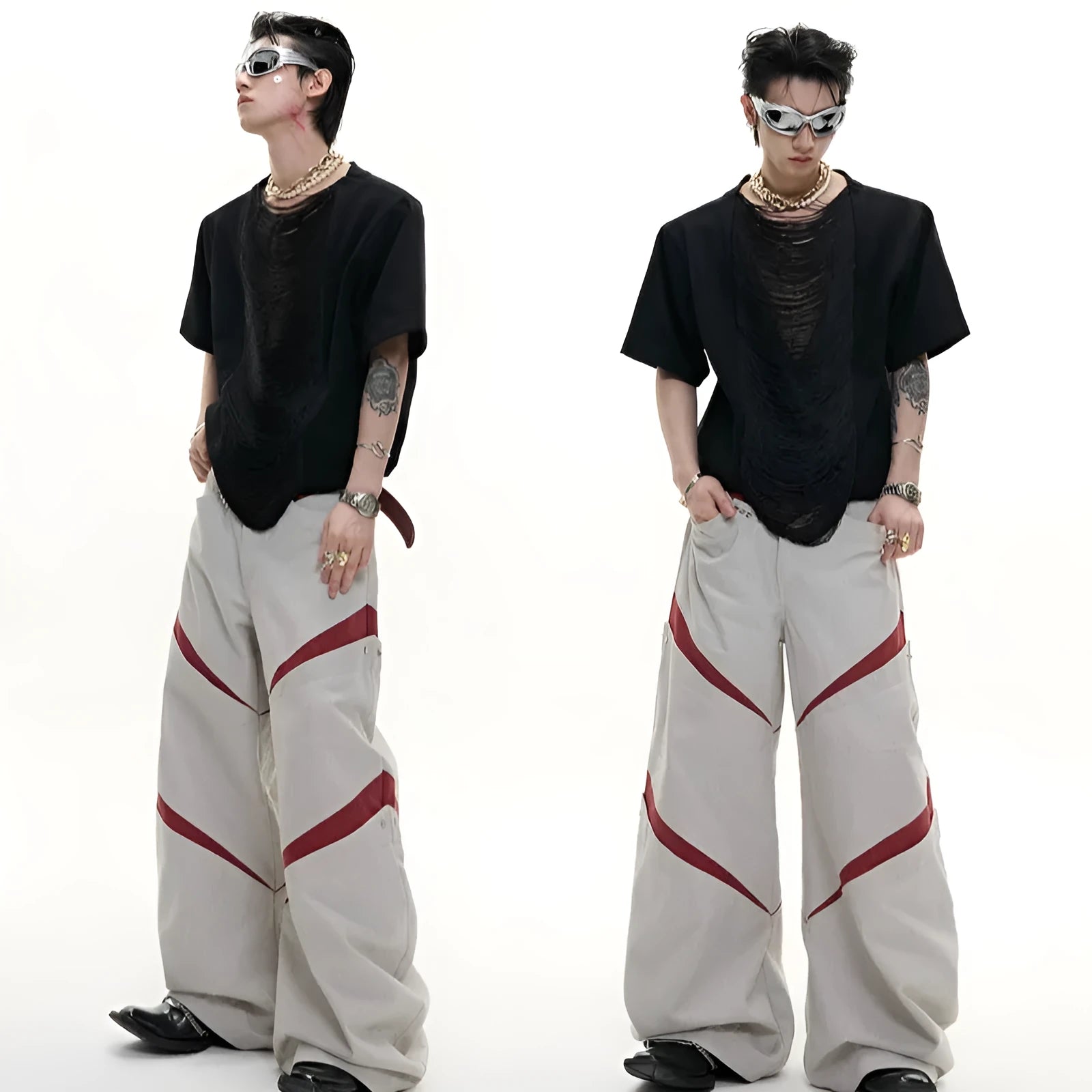Man wearing a loose-fit drum black V-neck polyester T-shirt with short sleeves and a tassel detail.