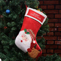 American folk art Christmas stocking with embroidered elk design in non-woven fabric