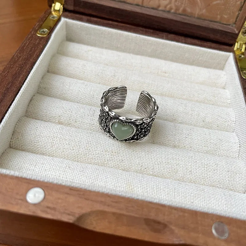 Retro wide-faced adjustable heart ring in white copper plated silver, available in green or white