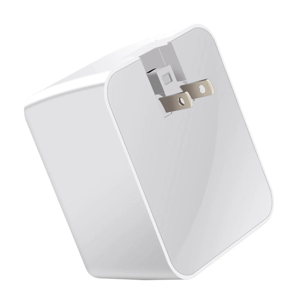 White travel charger with multiple USB ports and British plug for fast charging smartphones and tablets