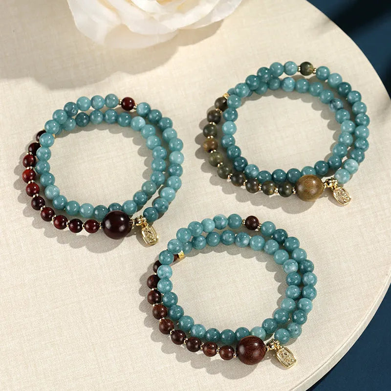Blue gold sandalwood beaded bracelet for women with geometric design featuring Fu and Xi characters in New Chinese style