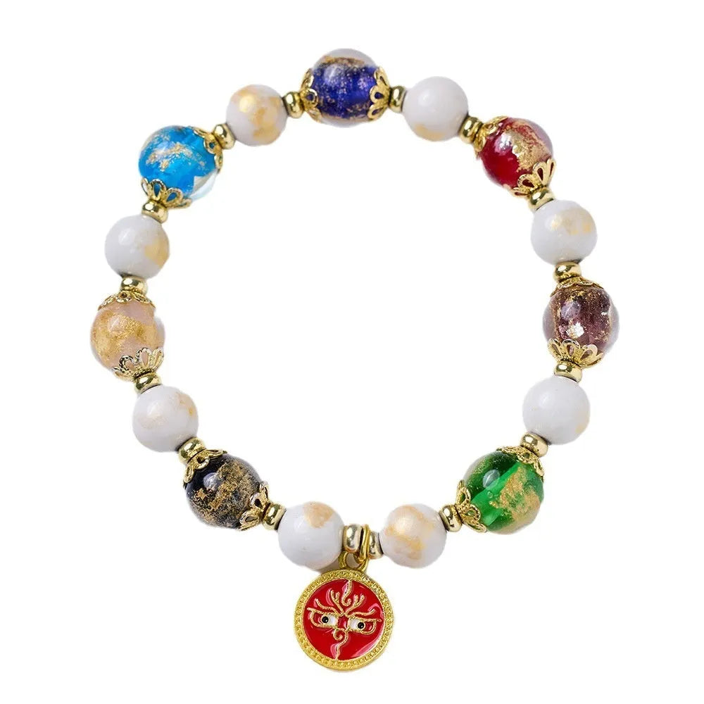 Fragrant Gray handmade glass bracelet with five Gods of Wealth design in coloured glaze.