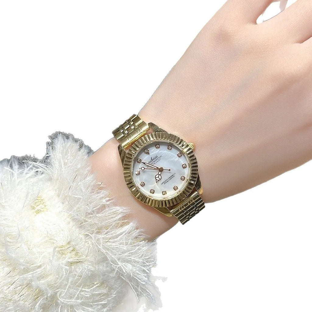 Women's rose shell watch with 7mm thin case, shown with white, red, or black leather strap or steel belt