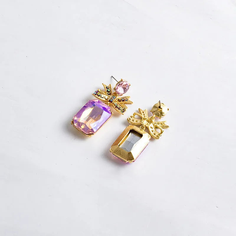 Crystal bow heart earrings for women in zinc alloy, retro style, shown in red, blue, white, and pink