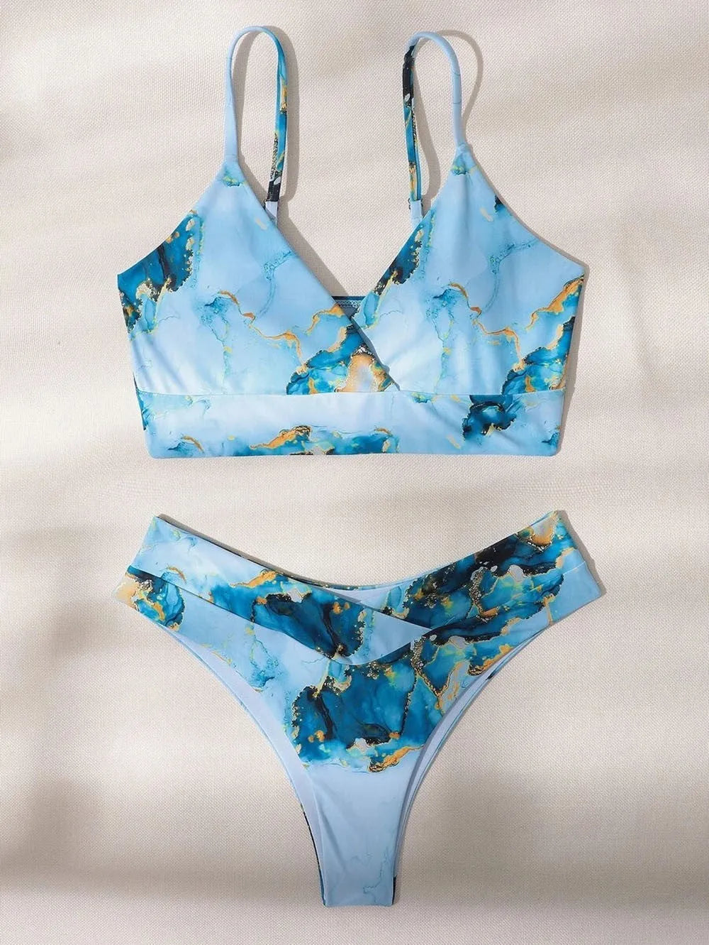 Women's high waist marble print bikini swimwear in a U-neck design.