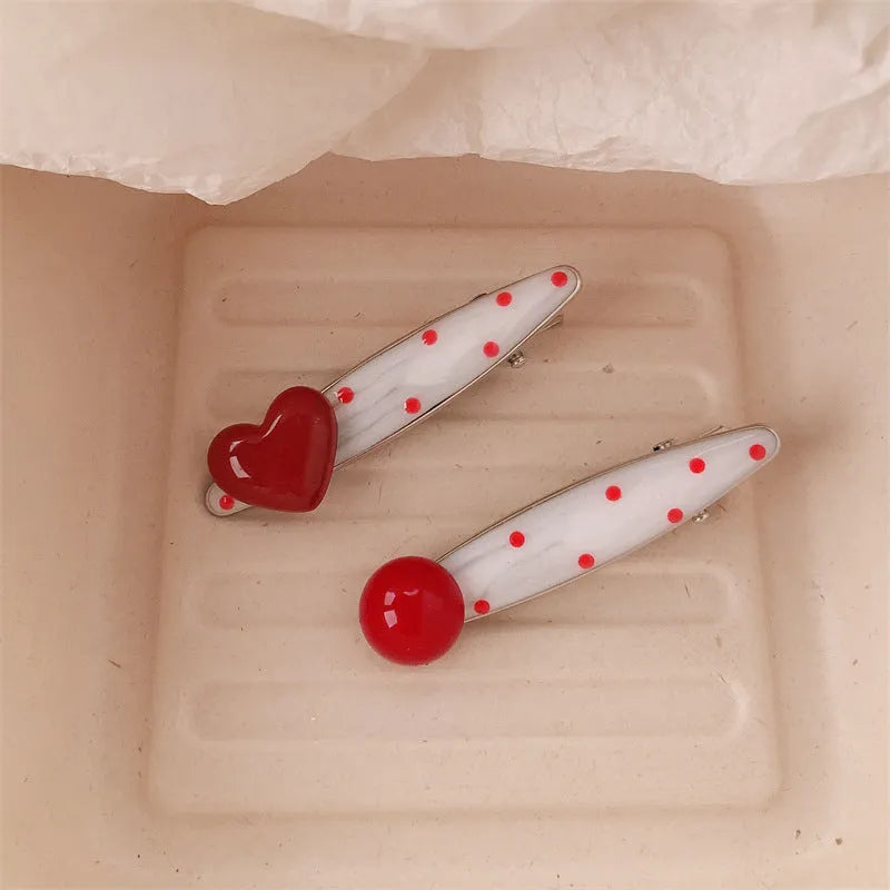 Red stereo love heart-shaped hairpin with French retro dots and willow leaf design
