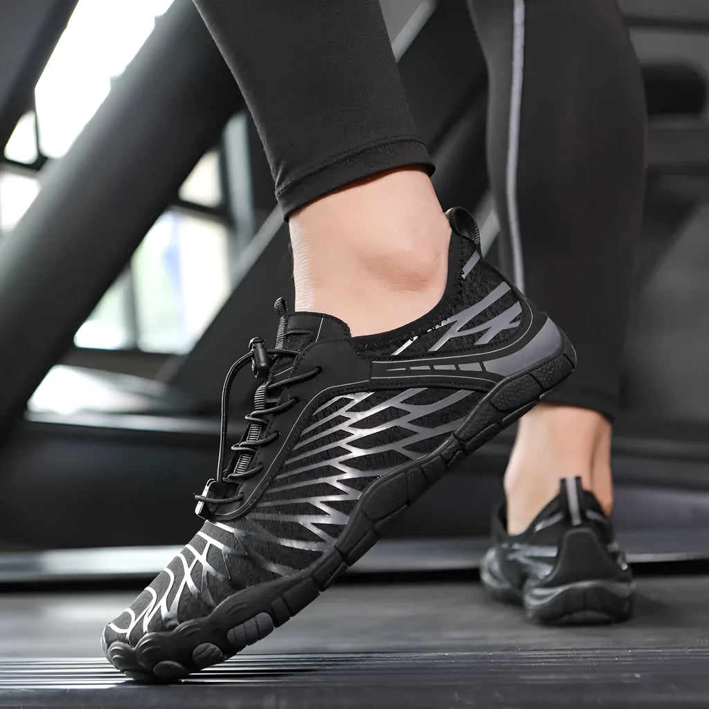 Pair of white lace-up casual sports shoes with a breathable lining and rubber sole.