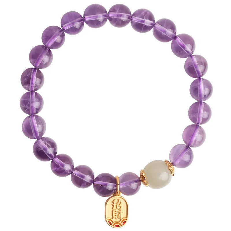 Amethyst colour crystal bead bracelet with 8mm round beads in a geometric national style design.