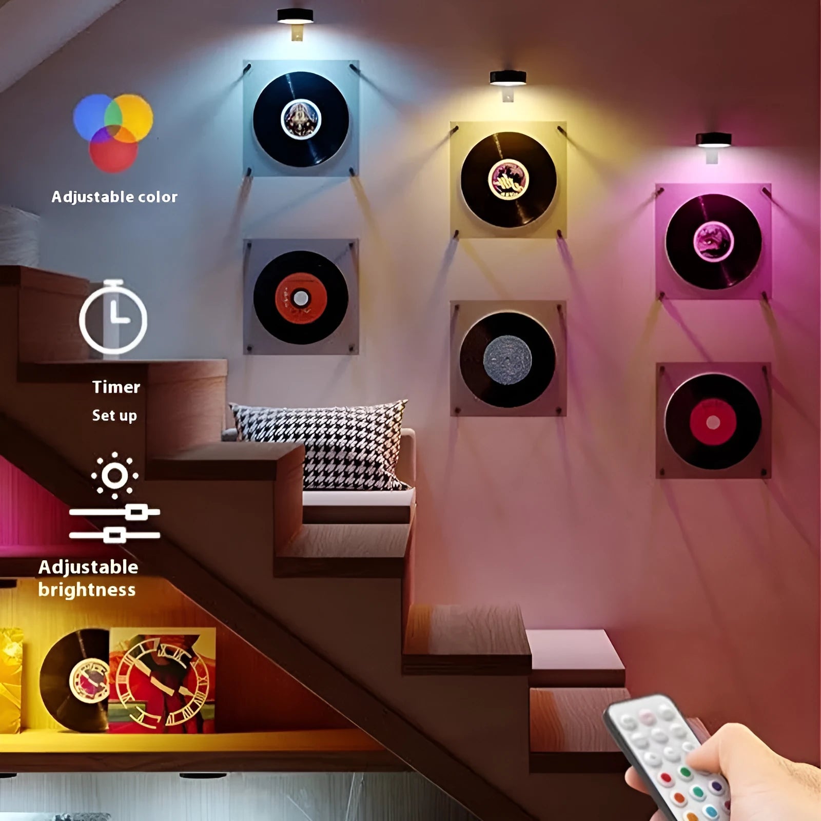 Black magnetic wireless LED lamp with remote control mounted next to a painting on a wall.