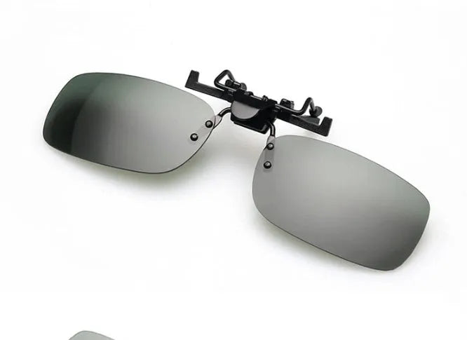 Plastic clip-on sunglasses overlay for prescription glasses, shown in large size with grey tinted lens.