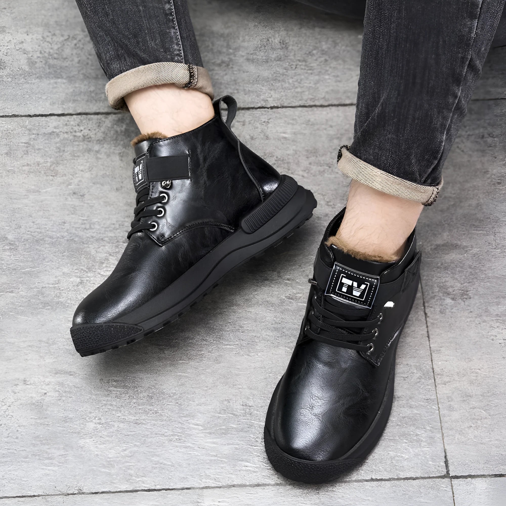 Black high-top platform Martin boots with a velvet-textured upper and thick rubber sole.