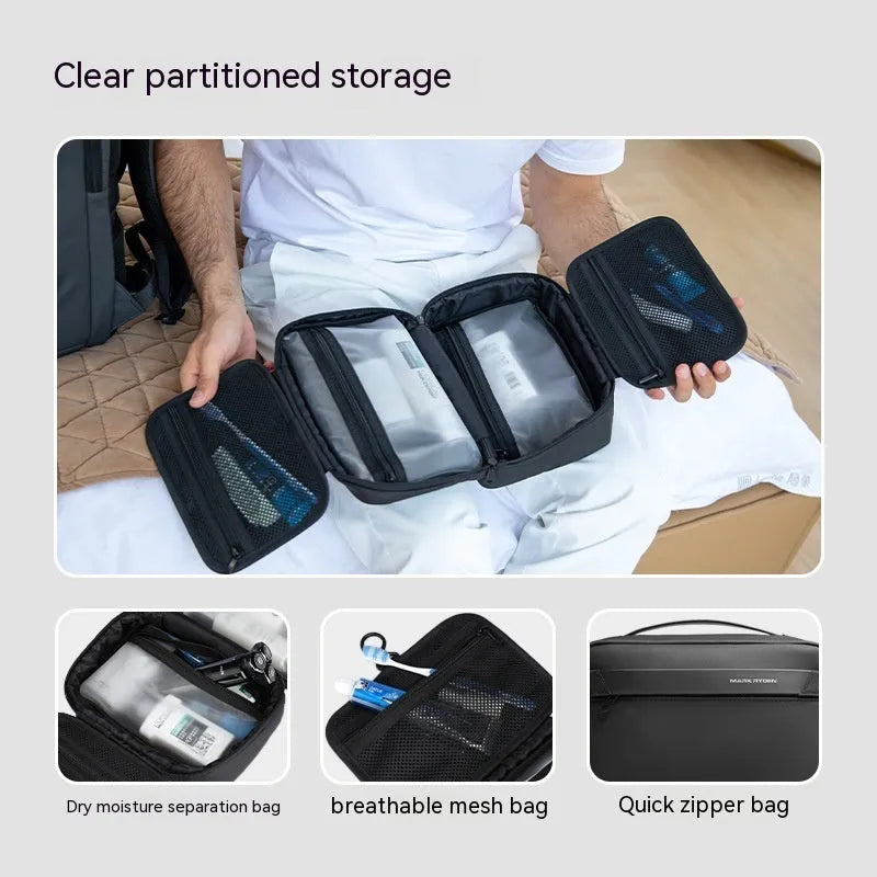 Black Oxford cloth toiletries bag with multiple compartments open, showing wet-dry separation design.