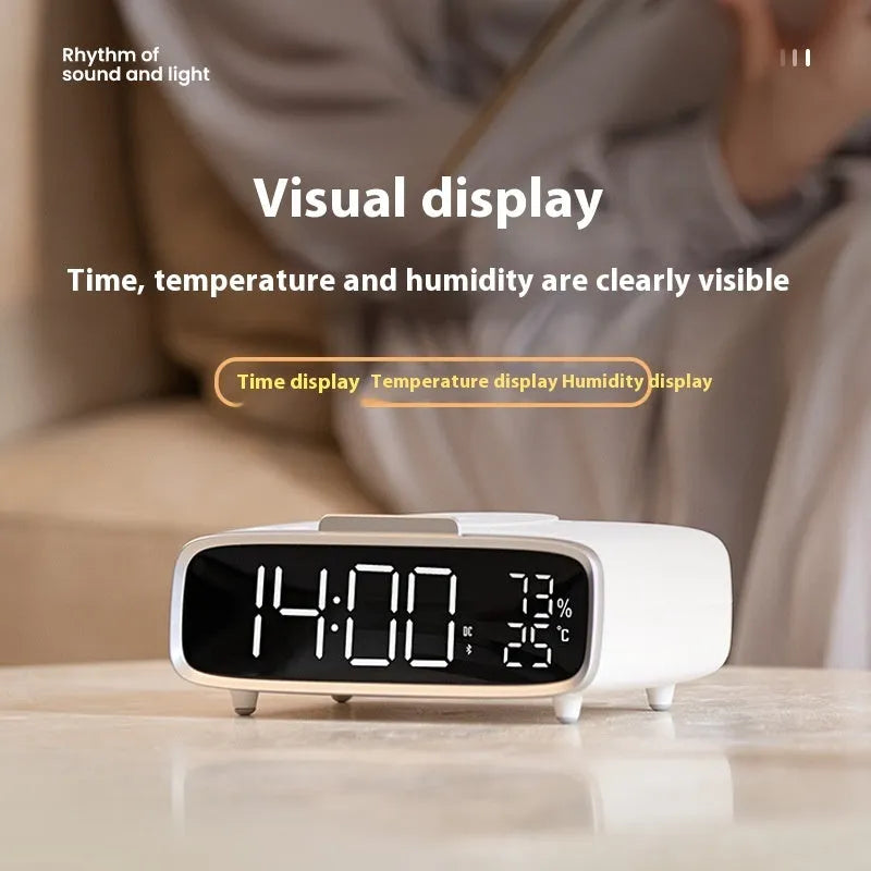 White wireless charging speaker alarm clock with Bluetooth and night light functions