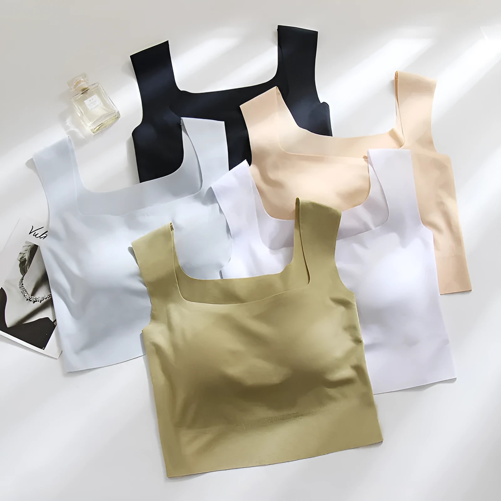 Women's seamless non-marking sling vest with thin mould cup in light blue.