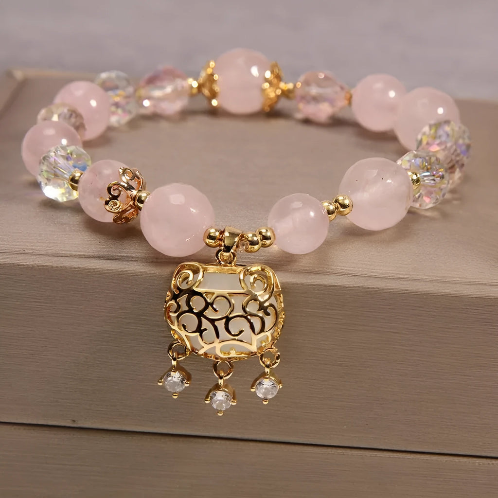 Yellow agate crystal bead bracelet on a gold silk cord with an adjustable metal clasp.