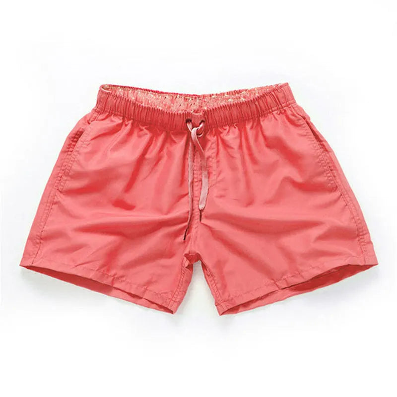 Men's straight leg polyester beach shorts in multiple colours with extended sizing options