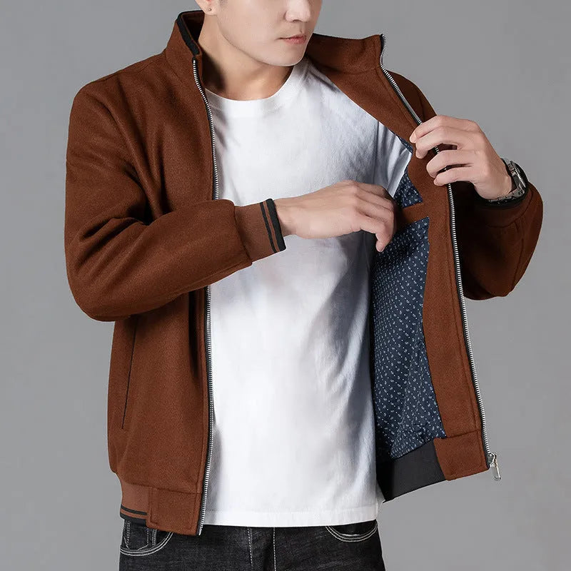 Men's grey woolen fleece autumn coat with long sleeves and size stick pockets on a sports style.
