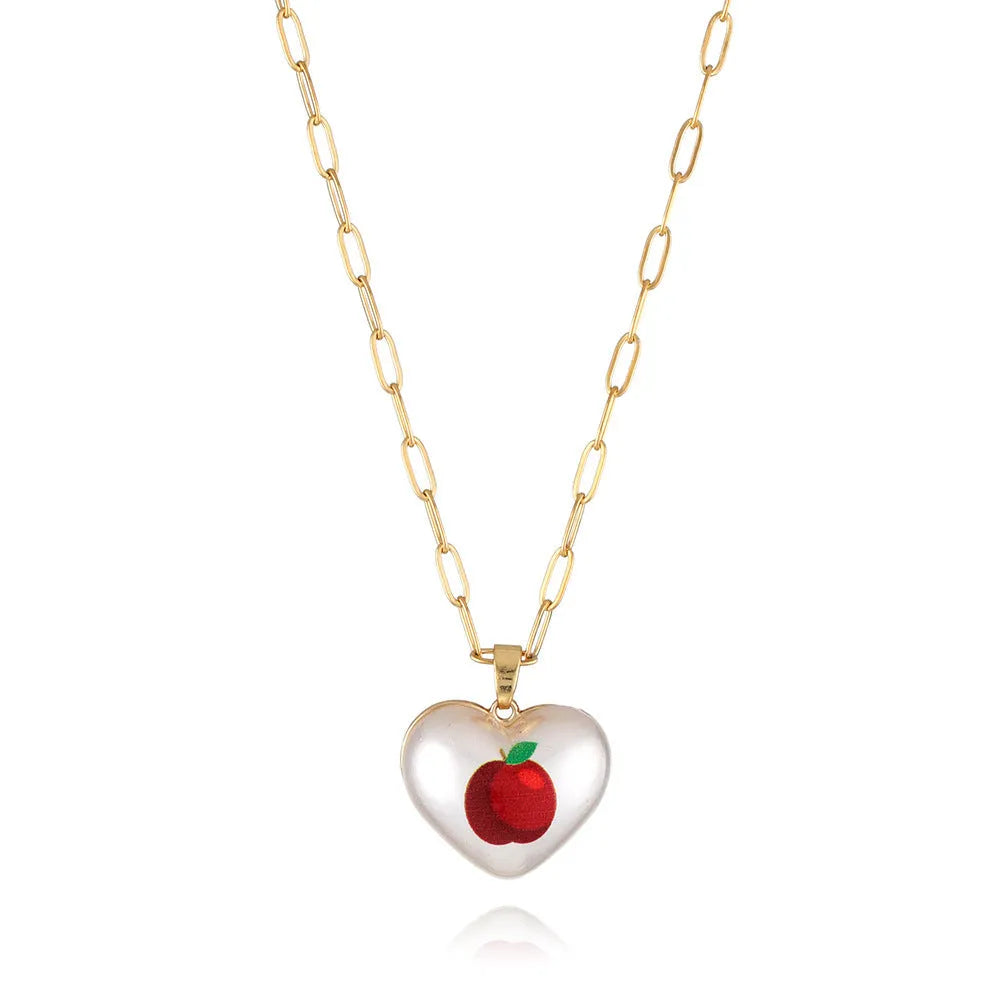 Heart-shaped necklace with fruit pendant on geometric chain showing strawberry pineapple apple pear cherry options