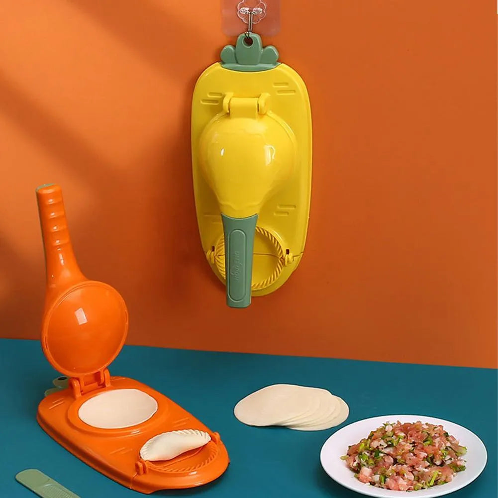 Orange and white manual dumpling skin press tool with ergonomic handle and hanging hole