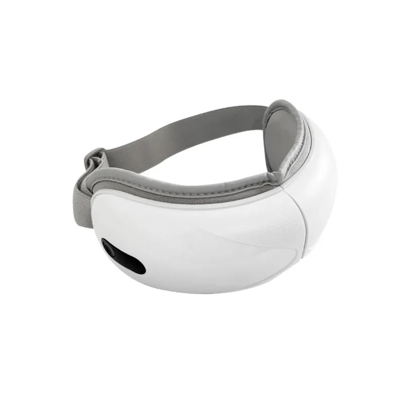White household eye massager with hot compress and airbag massage functions showing 140mm dimensions