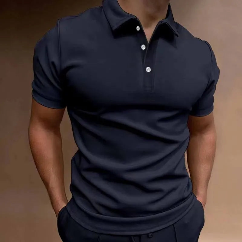 Man modelling a loose fit grey cotton blend short sleeve t-shirt.