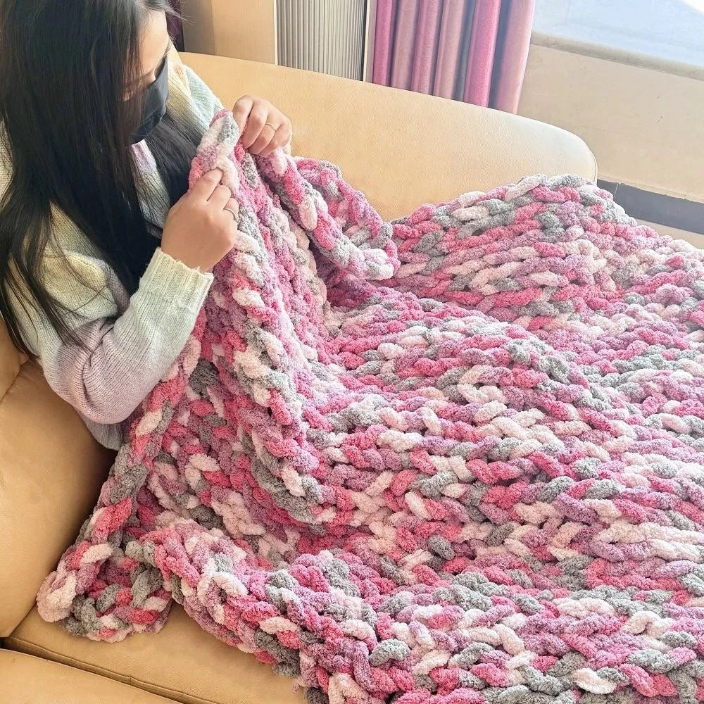 Coarse yarn chenille knitted blanket with braided gravity detail in modern colour option