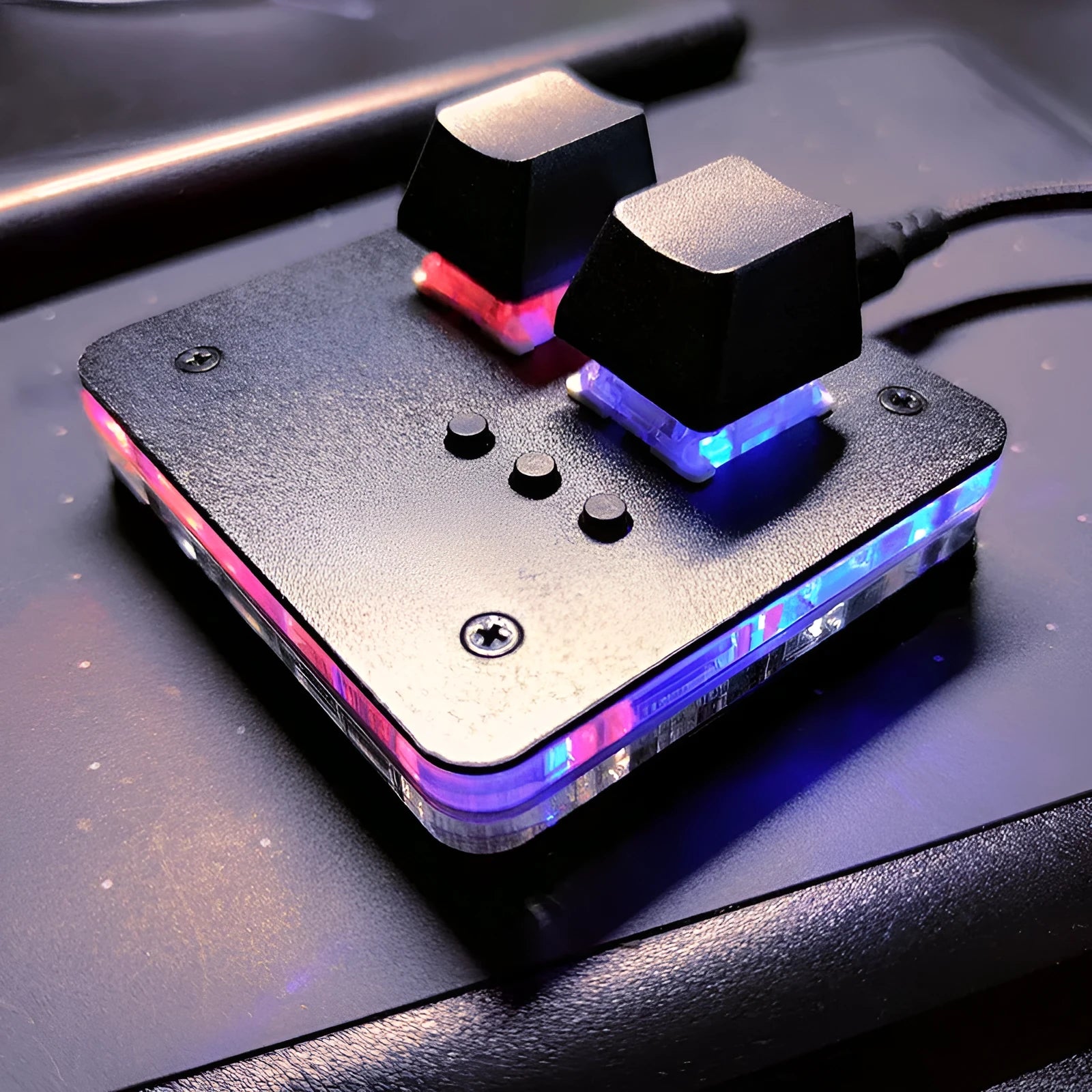Mini wired USB keyboard in black with multimedia function keys and a compact plastic design.