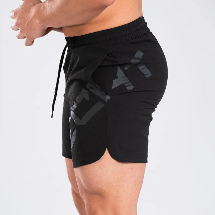 Men's elastic quick-drying nylon sports shorts in black colour for summer training activities