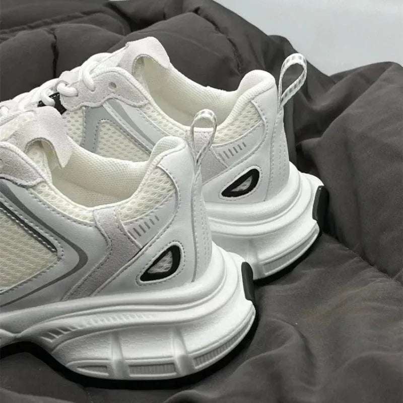 Beige Polar Wave mesh platform shoes with wedge heel and lace-up front on a rubber sole.