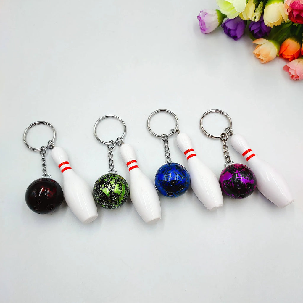 Miniature bowling alley simulation keychain pendant in blue colour with metal key ring