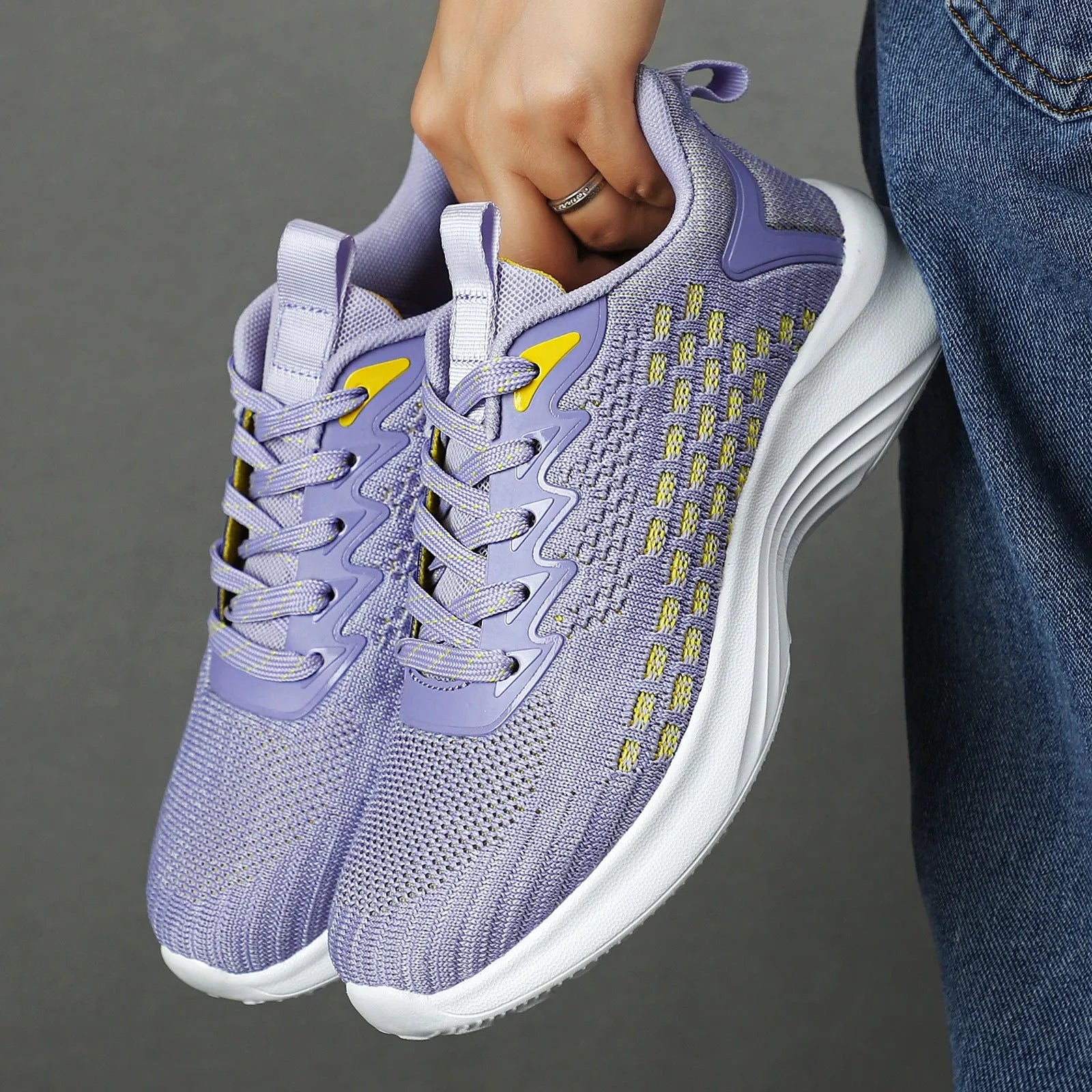 Women's Lavender Purple Flyknit running shoes with striped mesh design and EVA sole