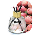 Glass bottle car perfume ornament with loose incense in decorative colours.