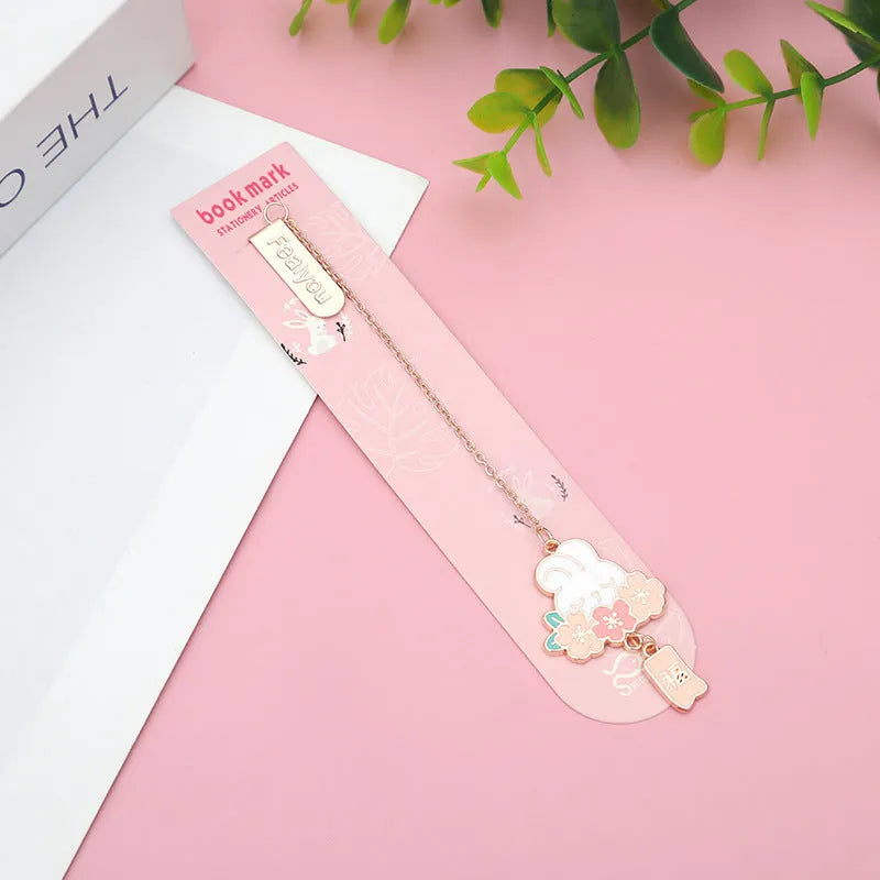 Metal pendant bookmark with engraved cherry blossom cat design, small decorative charm for book marking