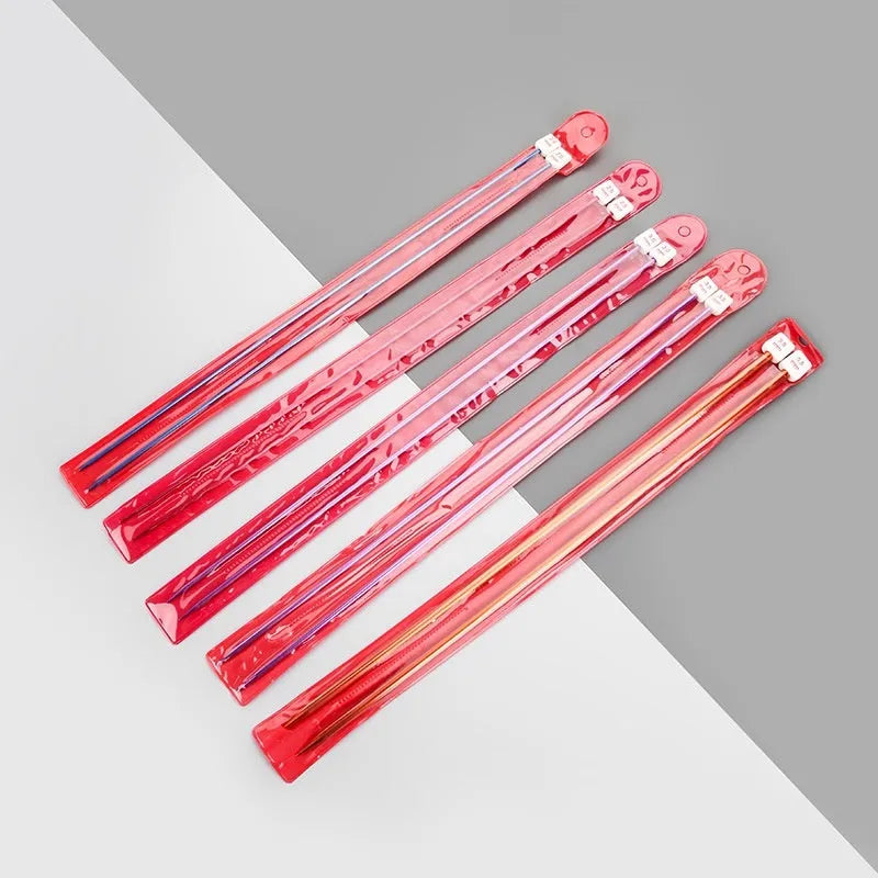 Lengthened crochet hook set showing multiple sizes from 2.0mm to 10.0mm, each with a protective cap.