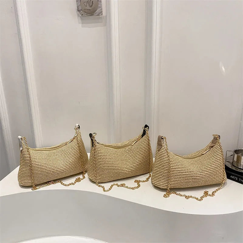 Woven straw crossbody handbag in horizontal square shape with phone compartment