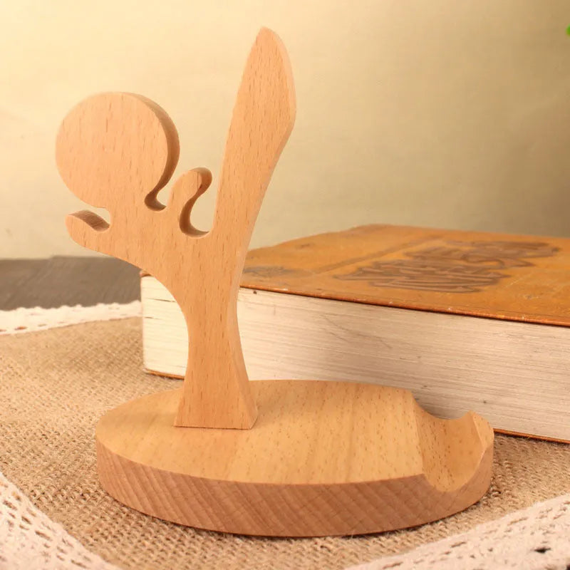 Handcrafted beech wood and resin lazy bracket mobile phone holder on a wooden desk