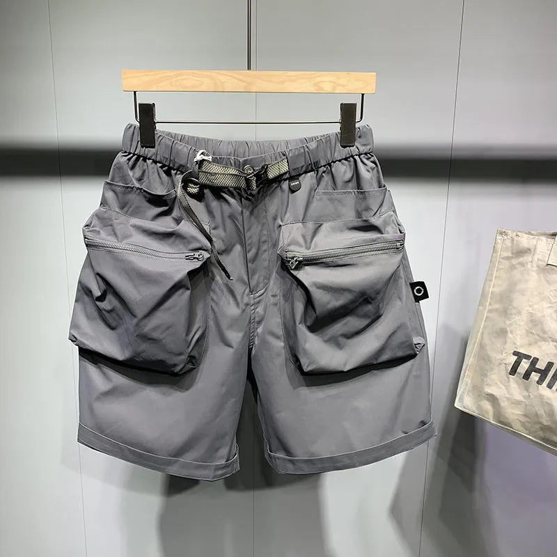 Men's large size work shorts with multiple pockets in black and grey colours