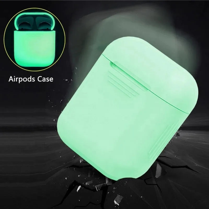 Luminous blue flip-top silicone protective case for Apple AirPods on a dark surface