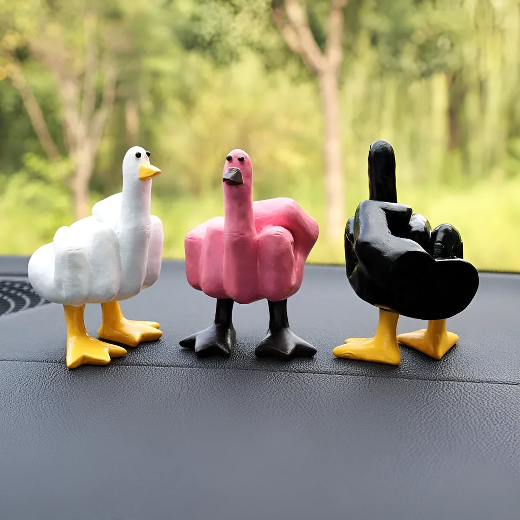 Creative vertical resin middle finger duck car ornament in pink on dashboard