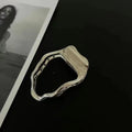 Women's zinc alloy hair barrette in gold colour with triangle shape