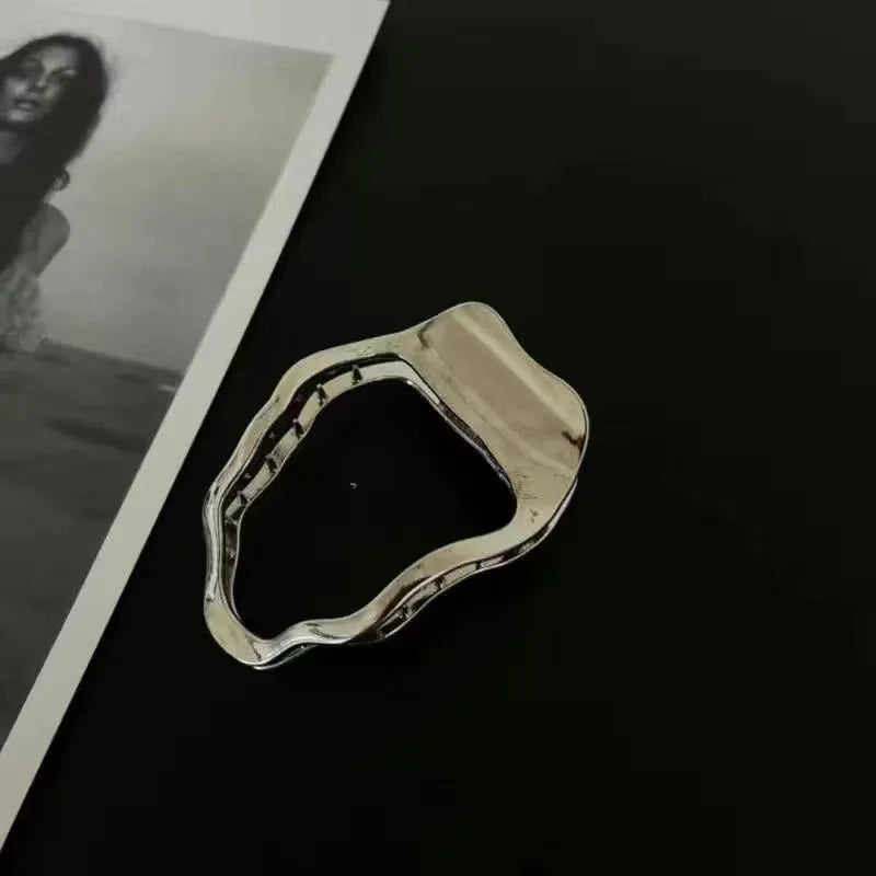 Women's zinc alloy hair barrette in gold colour with triangle shape