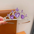 Girl's shiny metal headband with a crystal crown design in pink, light blue, and light purple colours.