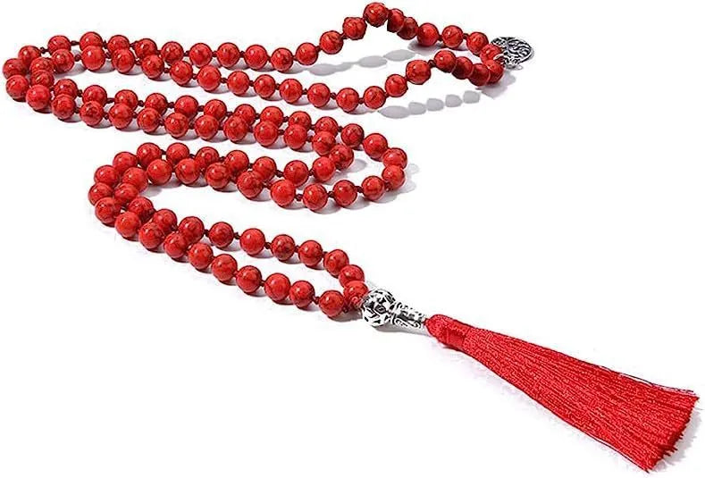 Handmade knotted stone bead necklace with 108 beads, showing geometric design and natural stone colours.