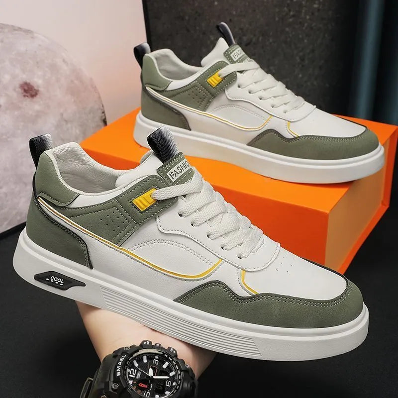 Men's low-top beige canvas board shoes with leather stitching details on a white background.
