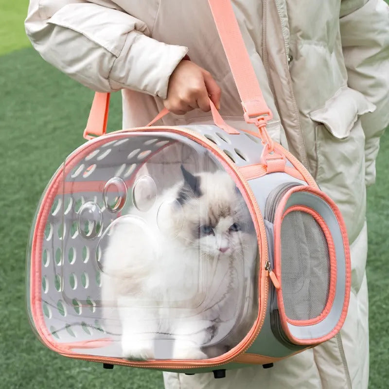Transparent EVA cat backpack carrier in grass green colour showing space capsule design