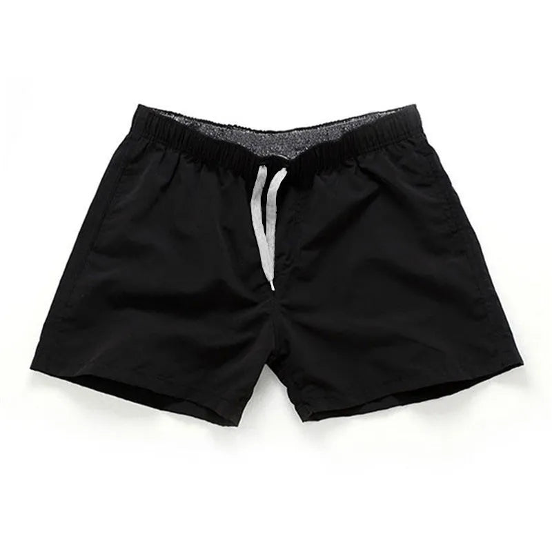 Men's straight leg polyester beach shorts in multiple colours with extended sizing options